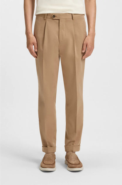 RELAXED-FIT TROUSERS IN COTTON-BLEND TWILL